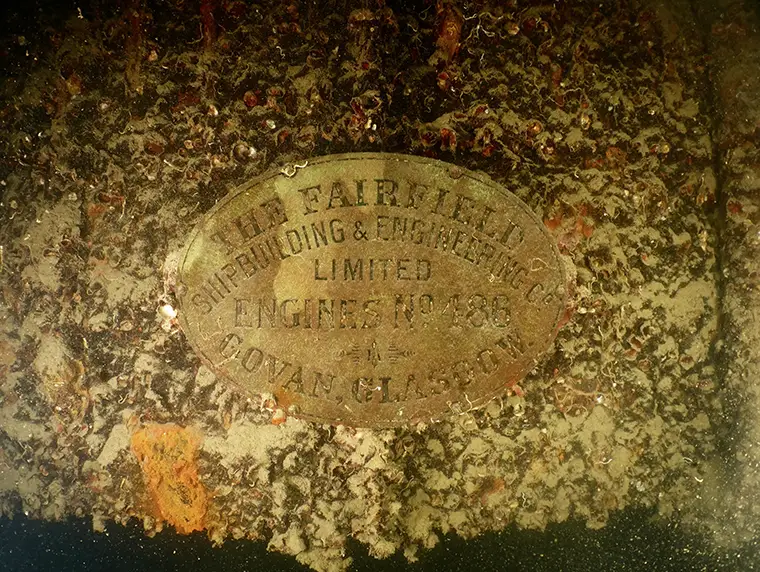 The identification plate of HMS Ermine