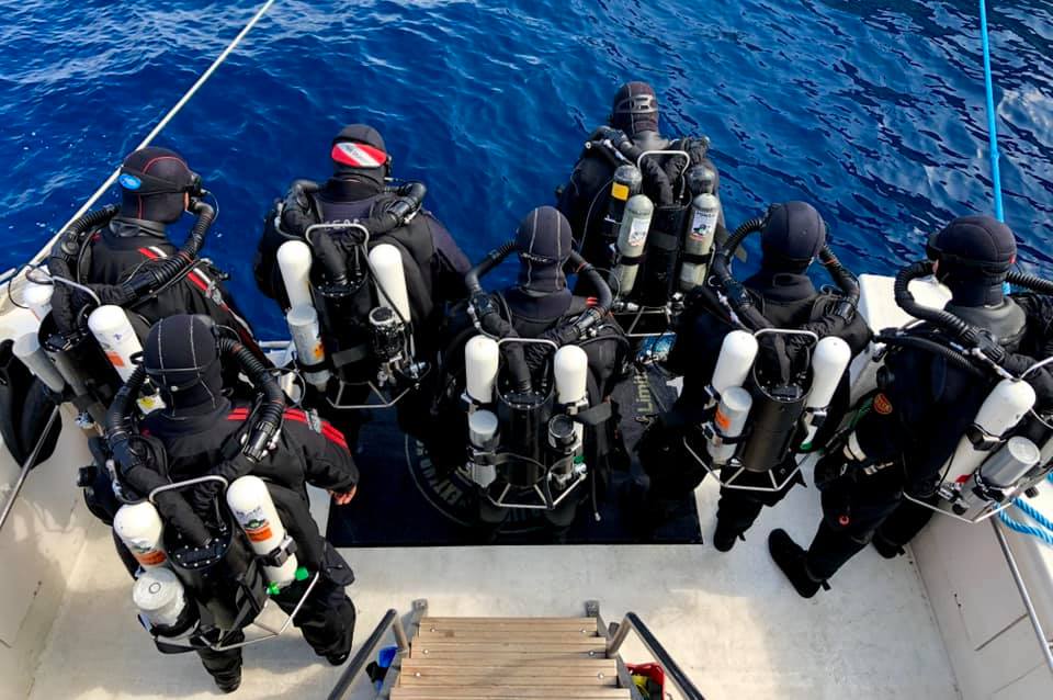 JJ -CCR divers  divers ready to make the jump near Ponza  Island, Italy