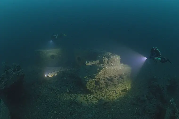 Gordan Shaw and Brian Kelly exploring the Sherman tanks