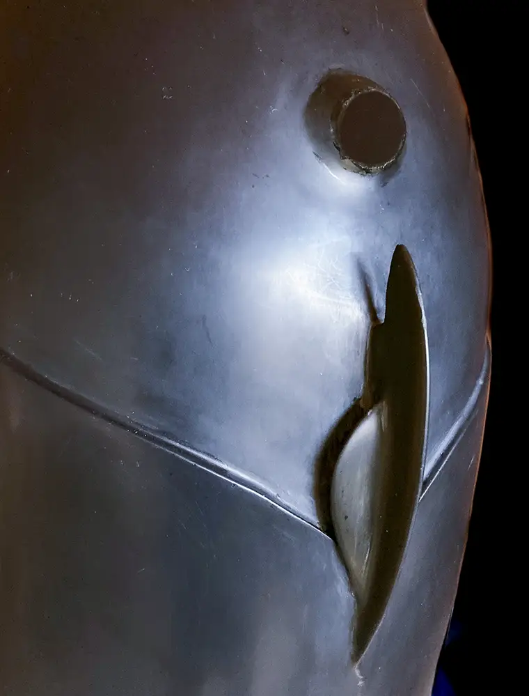 Detailed view of the magnets and keyed connection between the helmet and the rebreather