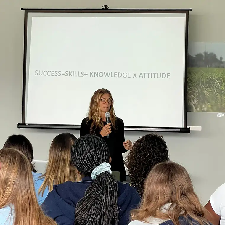 Education is a big component of Cristina's work and she spends her time teaching above as much as below the water. 